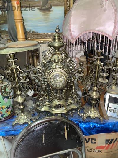 طقم شمعدان وساعه نحاس