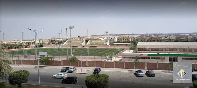 Apartment for sale with a special view of Sheikh Zayed Club, next to all services, empty without furniture.