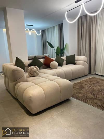 Furnished 105-square-meter ground-floor apartment with a garden for rent in Al Rehab City, just steps away from the Food Court, the Old Market, the ba