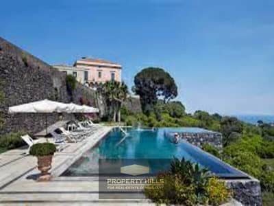Two-bedroom chalet with a distinctive sea view in The Mid compound, near the emirate cities.