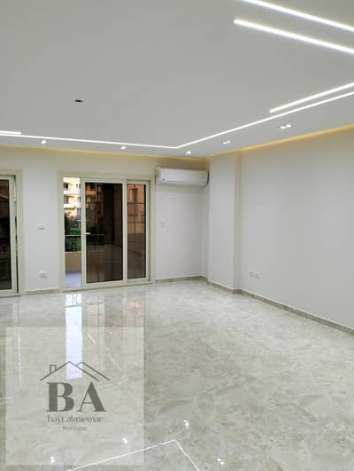 A very distinctive apartment inside the Al-Khamael compound in Sheikh Zayed in front of Hyper One. The apartment is in the third phase behind the Police Mosque next to the main gate of the Police Mosque, first balcony with air conditioning and an ultra super-lux kitchen next to services and the gate.