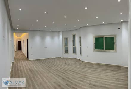 Unfurnished 200 sqm apartment with kitchen for rent in Al Narges 2 Villas, Fifth Settlement, located directly near Mohamed Naguib Axis, South 90th Str