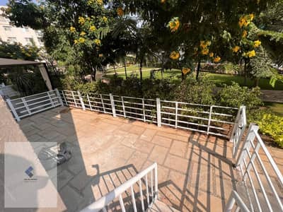 Apartment for rent in Madinaty Compound, New Cairo for immediate housing, area 116 consists of 2 bedrooms + 2 bathrooms with a direct view of the green spaces Garden view