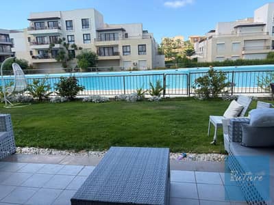 شاليه أرضي بجاردن للبيع في Blanca Marassi، الساحل الشمالي، سيدي عبد الرحمن، صف أول Lagoon، 125م، جاردن 150م، 2 Bedrooms، North Facin