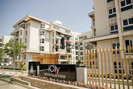 Apartment for sale in Mountain View iCity New Cairo prime location near landscape & clubhouse, near delivery, premium finishing with 10% down payment