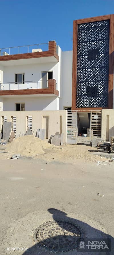 Apartment for sale in the Ninth District, Sheikh Zayed, ground floor with a garden
