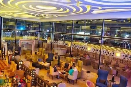 للإيجــــــار كافيه ومطعم 400م دورين بترآس خارجي مفروش ومجهز بجميع المعدات والأجهزة على أعلى مستوى  موقع تجاري وحيوي جداً