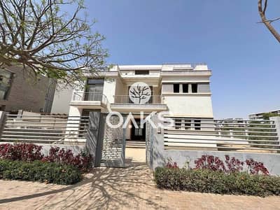 Fully finished villa for sale in taj city compound located in new cairo directly on Sue road and near to Cairo airport