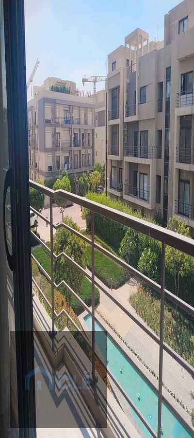 Luxury apartment with gardens View , semi-furnished with kitchen and air conditioning , available for rent at the lowest price in Al Marasem Compound