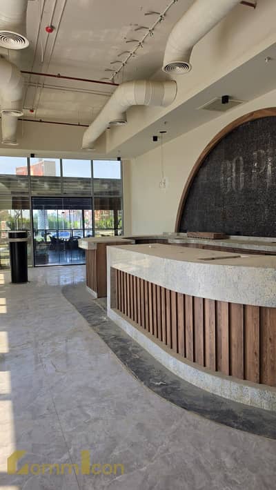 Shop for rent, fully finished, directly on North 90th Street in Fifth Settlement