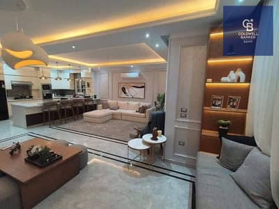 Apartment with modern finishing, ready for near-term handover | Swan Lake Residences by Hassan Allam | Directly on Suez Road | Special cash price with