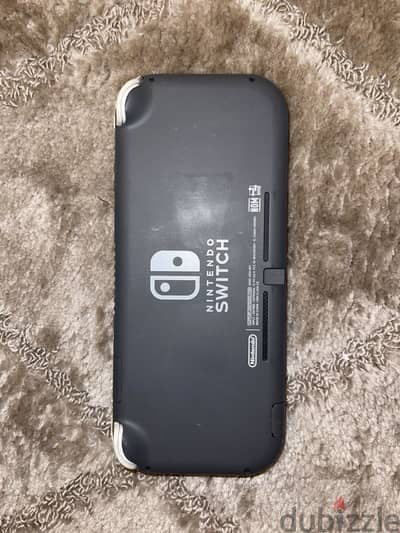 Switch lite like new بالجراب و سكرين ازاز و العلبه بتاعتو