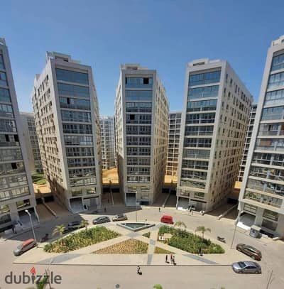 120 m apartment for sale in Compound One Katameya with a distinguished front view and garage