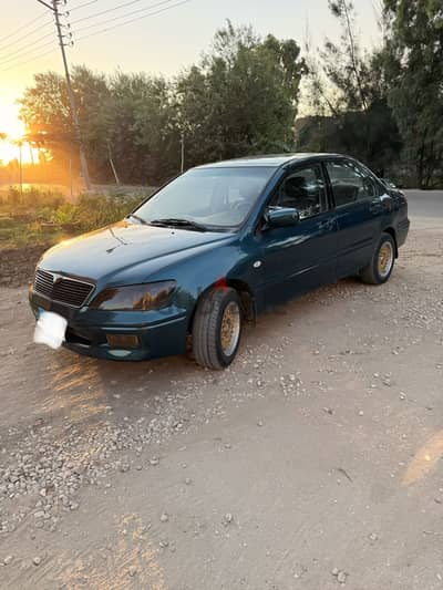 Mitsubishi Lancer 2001 لانسر مكوه