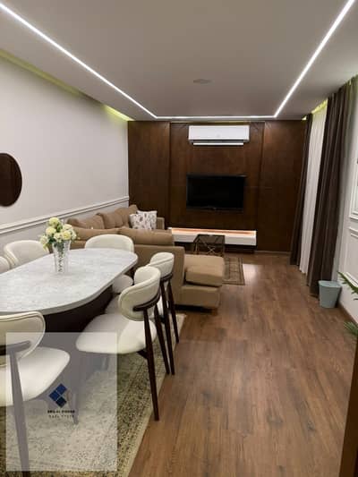 Apartment for rent in Madinaty Compound, New Cairo for immediate residence, area 103 consists of 2 bedrooms + 2 bathrooms with a direct view of the green spaces Garden view