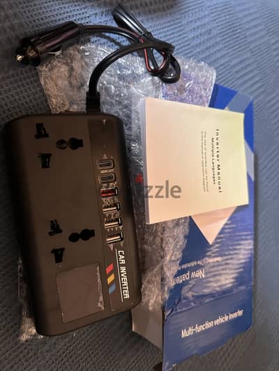 Multiple use car inverter with safety button and screen