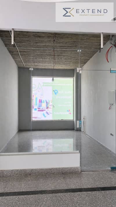 At the lowest price per meter in the heart of 6 October on the central axis, a commercial unit for rent with an area of 20m inside a mall with high visitor traffic and suitable for all activities