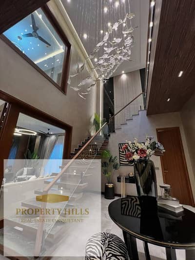Standalone villa for sale in New Cairo for less than its original price, with installments up to 12 years, only a 5% down payment, and a 26% discount.