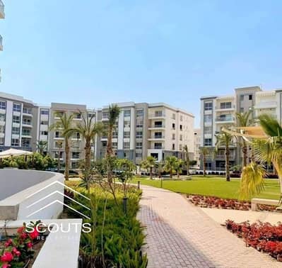 **114m 2-bedroom apartment for sale in New Cairo at a special price. Open landscape view on two sides, minutes from Golden Square & AUC. **