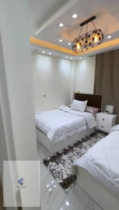 Apartment for rent in Madinaty Compound, New Cairo for immediate housing, area 100 consisting of 2 bedrooms + bathroom with direct view of green spaces Garden view