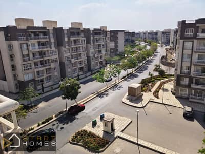 Fully air-conditioned, 107-square-meter, 3-bedroom furnished apartment for rent in Madinaty (B12), featuring a distinctive view of the park and the st