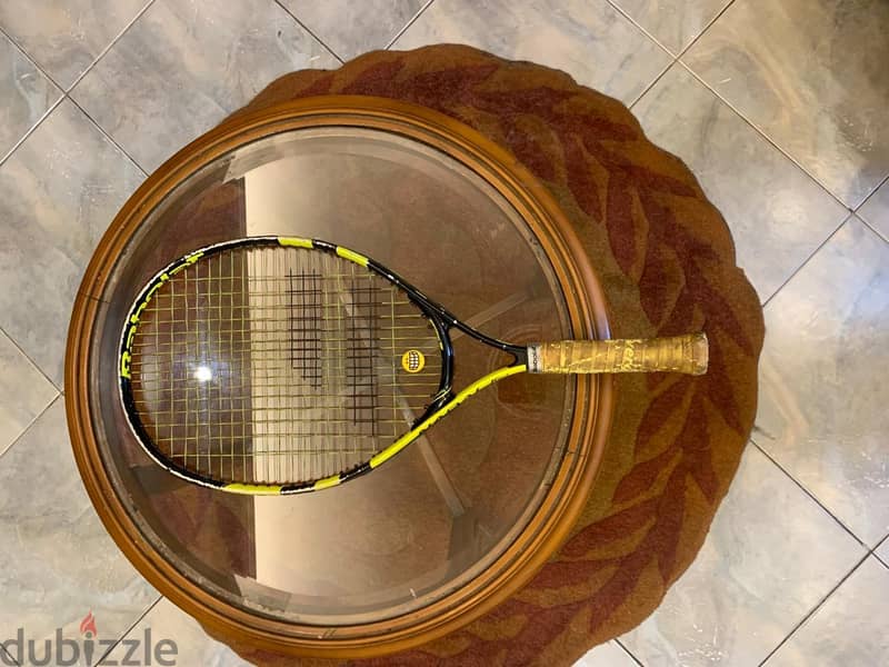 3 tennis rackets 6