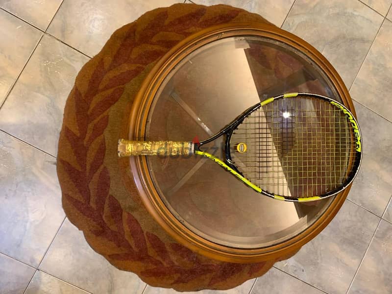 3 tennis rackets 7