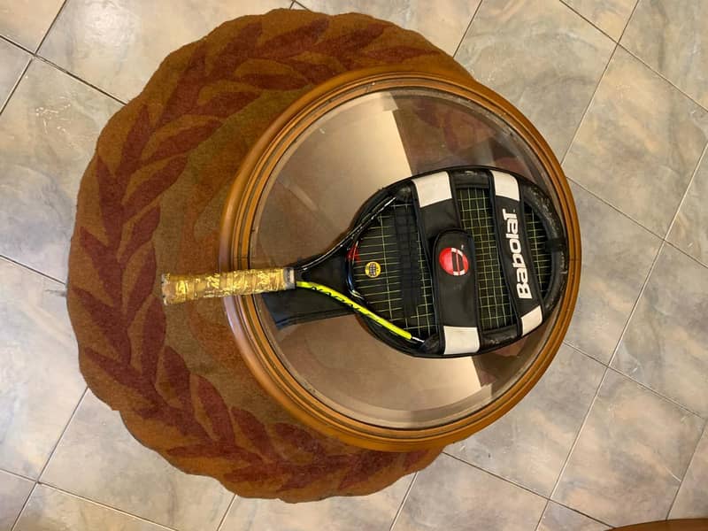 3 tennis rackets 8