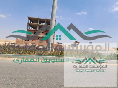 ارض للبيع  اكتوبر الجديدة شمال المطار قرعة 2018 التكملي مميزة مسلسل 1