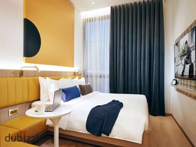 A prime 57m² studio apartment for sale opposite the Oasis Hotel and next to the Pyramids, with daily rental income in dollars. Ready for immediate vie