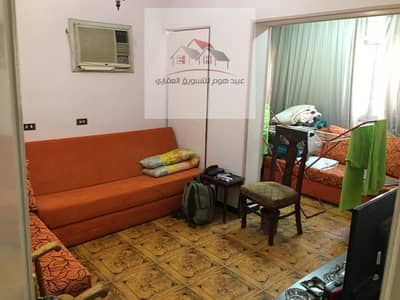 Apartment for sale in a prime location in Nasr City, a street branching from the extension of Makram Ebeid, parallel to Mostafa El-Nahas, overlooking the street