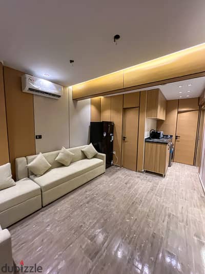 Studio with a room and a living area for sale in the best location in 6th of October City, First District, 8th Neighborhood, steps from MSA University and Wadi Degla Club. The studio area is 40 square meters, mandatory rent for each studio is 13 thousand with an increase of 1 thousand each year. Price of the studio, room and living area, kitchen and bathroom for sale is 1 million 300 without furniture.