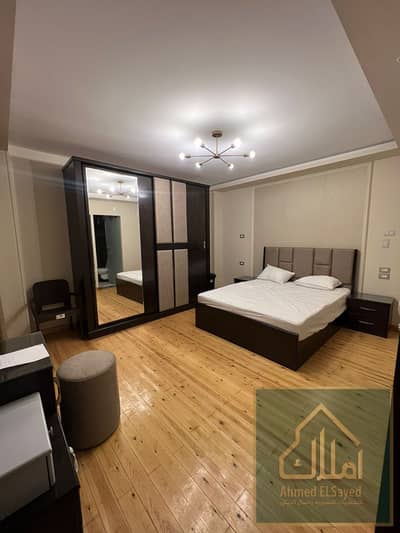 Apartment b11  Wide garden 3 rooms and a hall, kitchen, and two bathrooms, reception, marble, and wooden rooms, shower cabins, sound system, natural gas, open view, one month in advance and two months deposit, rent 45,000