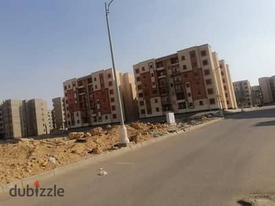 A plot of land in "Series A"—with three installments paid and a building permit issued.