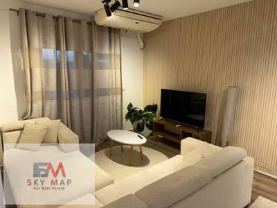 For rent, 81m furnished with hotel furniture, first occupancy in Madinaty B12 in front of the Craft Zone