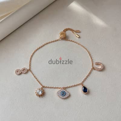 Swarovski - Symbolica bracelet - Infinity, Blue, Rose gold-tone plated