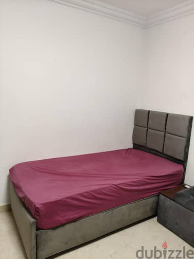 single bedroom bed 1m by 2m,baneket,study desk and cupboard