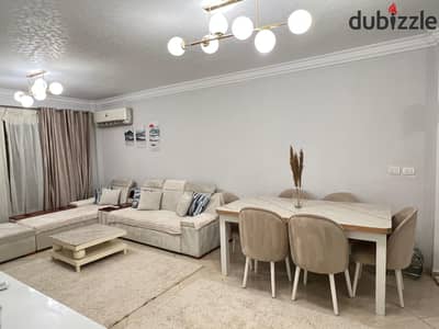 140 m fully furnished and fully air-conditioned apartment for rent in Dar Masr, District 12