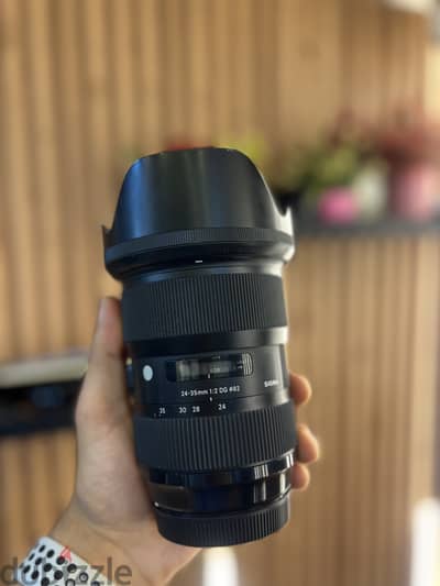 Lens sigma canon 24/35 f. 2.