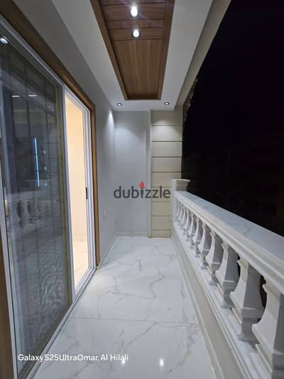 150 meter apartment front center at the Pyramids Gardens -