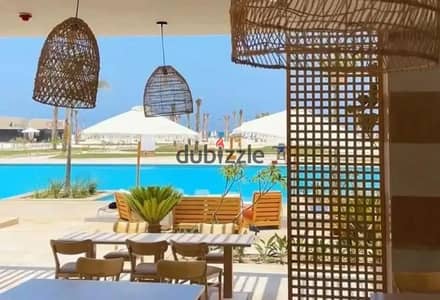 A fully finished chalet in the best location in North Coast, at Km 207 Ras El Hekma, Sea Shore Hyde Park compound, with a 5% down payment and installm