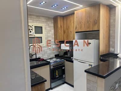 Furnished apartment for rent in Al Rehab City. Second floor, 90 square meters, near all amenities. Consists of: 2 bedrooms, 1 bathroom, kitchen, and r
