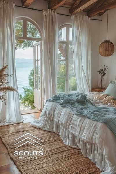 Fully finished first row beachfront chalet for sale at La Vista Topaz Ain Sokhna featuring a stunning view of the sea and the swimming pool