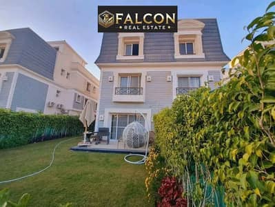 A villa with a garden, VIP finishing, and a landscape view is for sale in Aliva Mountain View Compound, Mostakbal City, next to Haptown and Green Squa