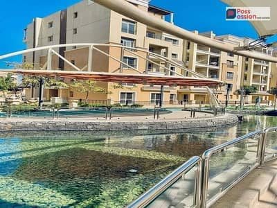 apartment for sale in Sarai – New Cairo with 50% discount on the total price, featuring a prime location on Suez Road next to Madinaty