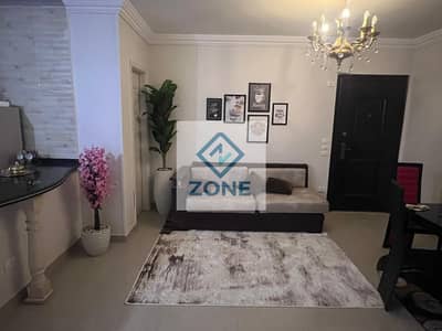 Ground-floor apartment with a garden for sale in Madinaty, B7.
