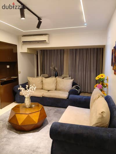 Furnished, air-conditioned hotel-style apartment next to City Stars, available for daily and monthly rent for families. Excellent location in Nasr Cit