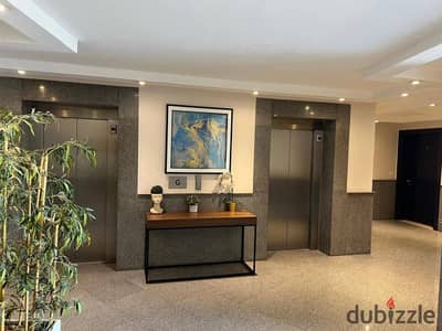 Luxury Apartment للإيجار في Cairo Festival City – Living | Ultra Modern | Greenery View | Prime Location   لو بتدور على Luxury Living داخل Cairo Fest