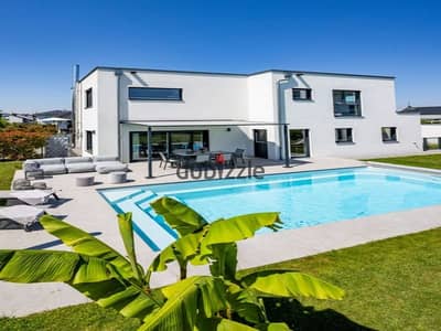 Next to Mountain View, a villa for 1,970,000 (discounted), 256 sq m + private garden, for sale in Zayed. Located in a compound exclusively for villas,