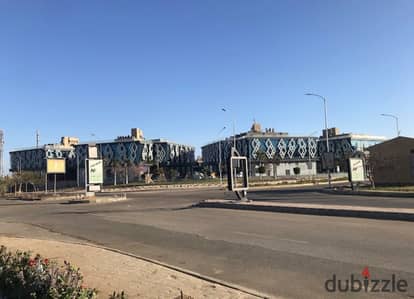 Commercial shop for rent: 35sqm indoor and 32sqm outdoor- Lowest price per square meter in the area- Located directly across from Mall of Arab